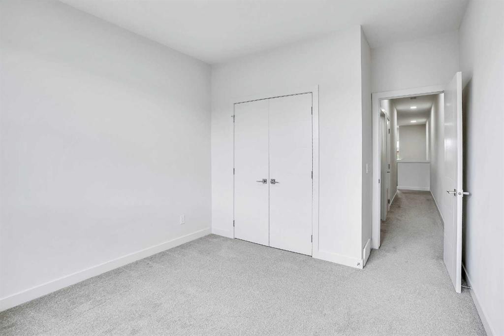 106-116 Saddlestone Heath Ne, Calgary, AB - Indoor Photo Showing Other Room