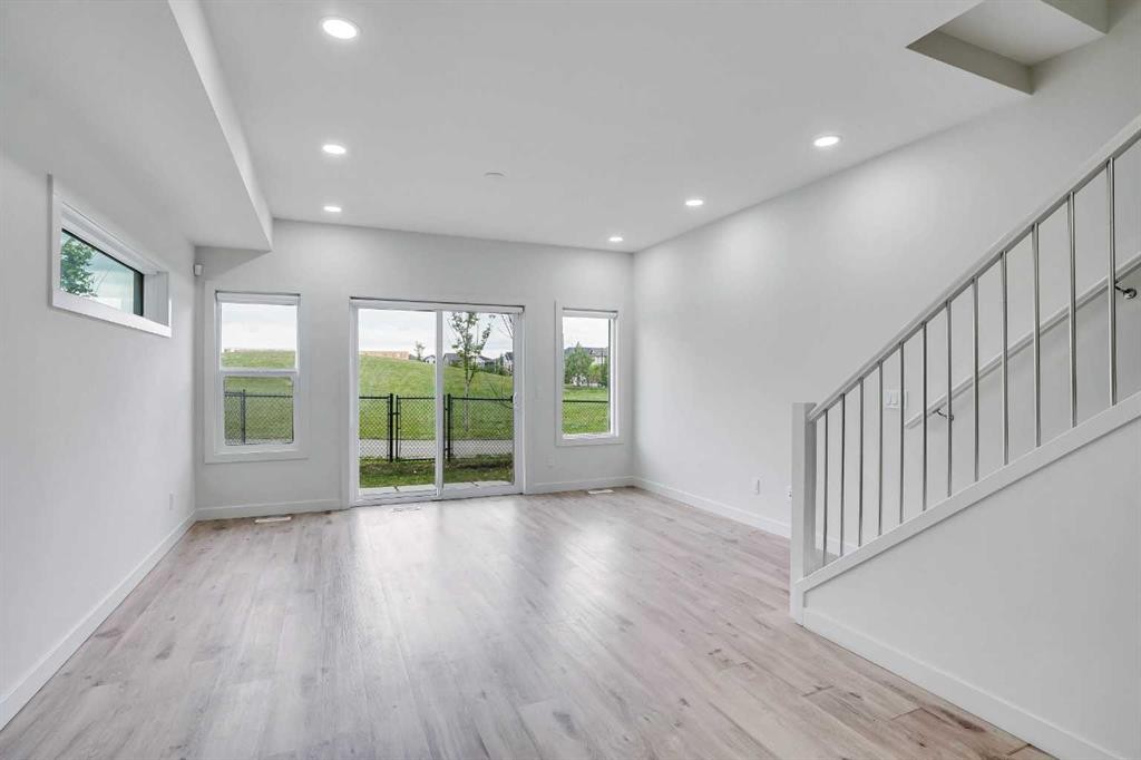106-116 Saddlestone Heath Ne, Calgary, AB - Indoor Photo Showing Other Room