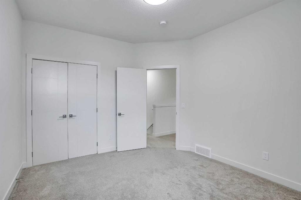 106-116 Saddlestone Heath Ne, Calgary, AB - Indoor Photo Showing Other Room