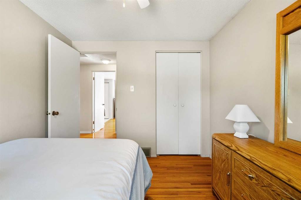 1102 Lake Christina Way Se, Calgary, AB - Indoor Photo Showing Bedroom
