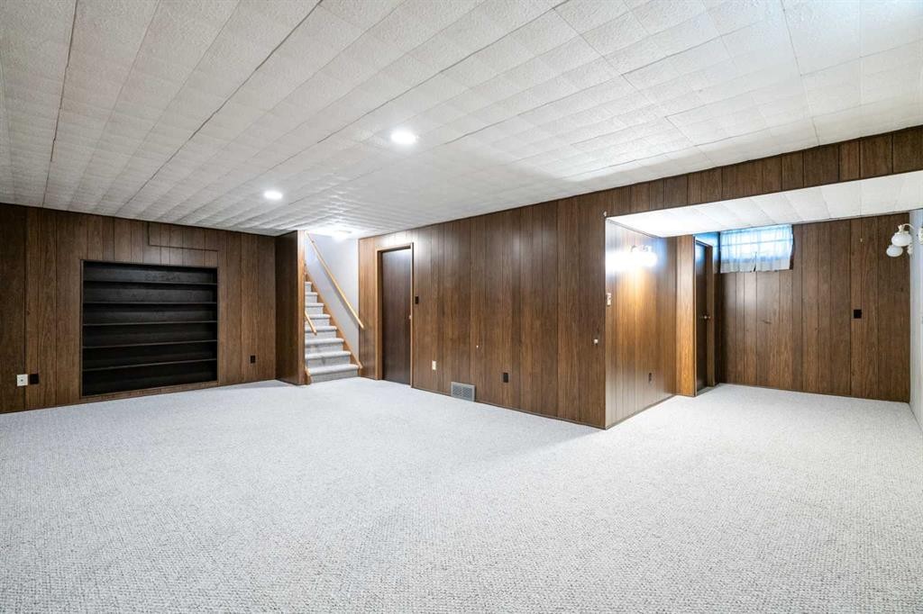 1102 Lake Christina Way Se, Calgary, AB - Indoor Photo Showing Basement