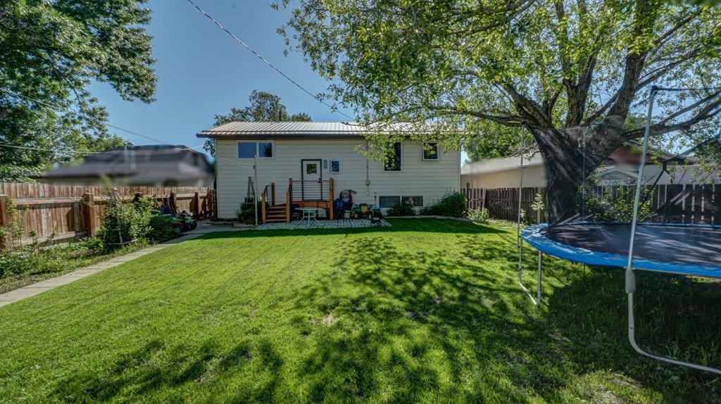 5213 3A Street West, Claresholm, AB - Outdoor With Backyard