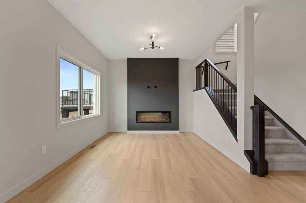 38 Waterford Mews, Chestermere, AB - Indoor With Fireplace