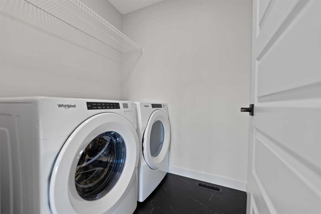 38 Waterford Mews, Chestermere, AB - Indoor Photo Showing Laundry Room