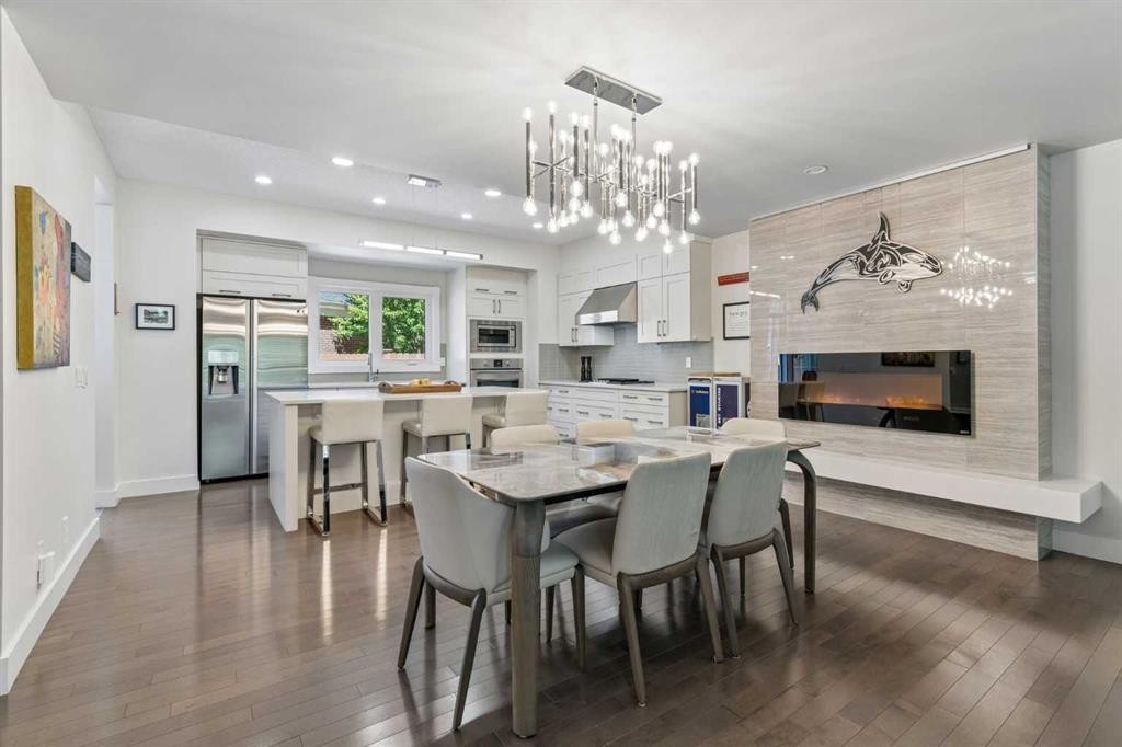 38 Victoria Cross Boulevard Sw, Calgary, AB - Indoor Photo Showing Dining Room With Fireplace