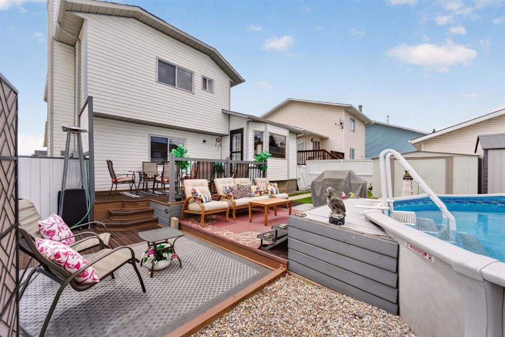 70 Pasadena Gardens Ne, Calgary, AB - Outdoor With Deck Patio Veranda