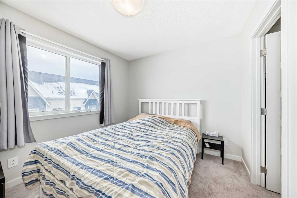 806-32 Red Embers Parade Ne, Calgary, AB - Indoor Photo Showing Bedroom