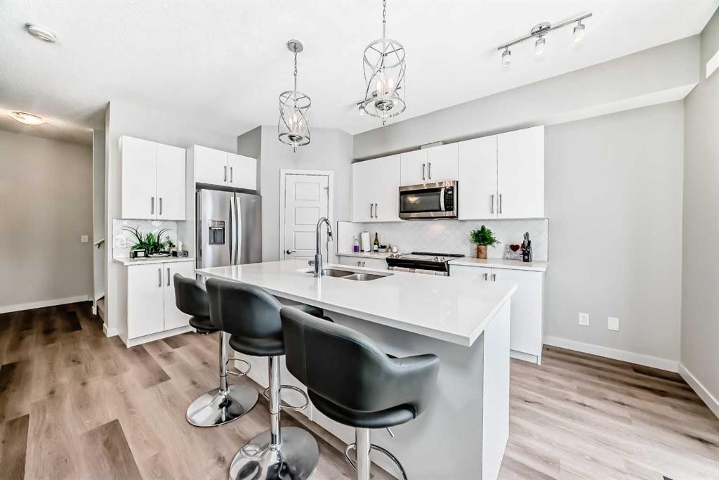 806-32 Red Embers Parade Ne, Calgary, AB - Indoor Photo Showing Kitchen With Stainless Steel Kitchen With Double Sink With Upgraded Kitchen
