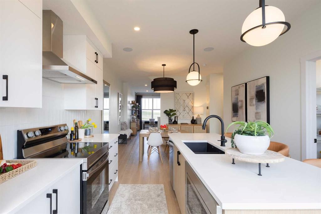 150 Wild Rose Way Se, Calgary, AB - Indoor Photo Showing Kitchen With Upgraded Kitchen