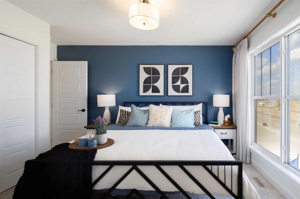 150 Wild Rose Way Se, Calgary, AB - Indoor Photo Showing Bedroom