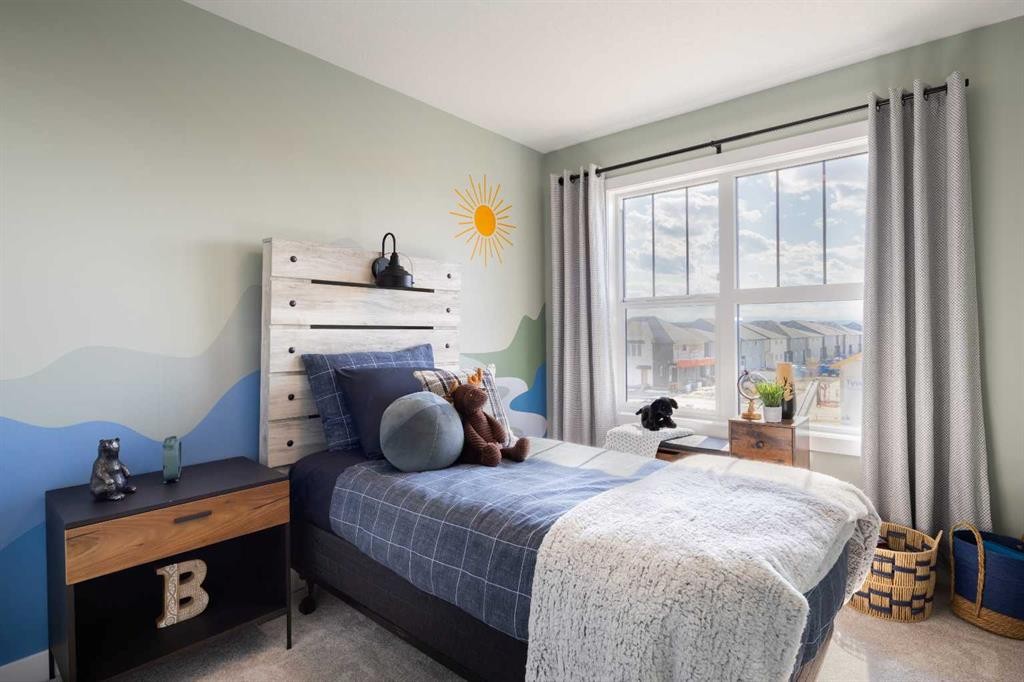 150 Wild Rose Way Se, Calgary, AB - Indoor Photo Showing Bedroom