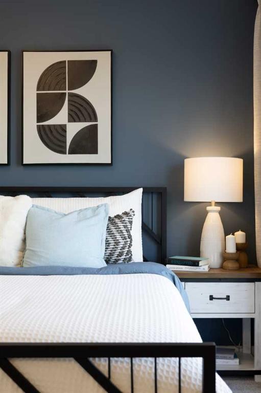 150 Wild Rose Way Se, Calgary, AB - Indoor Photo Showing Bedroom