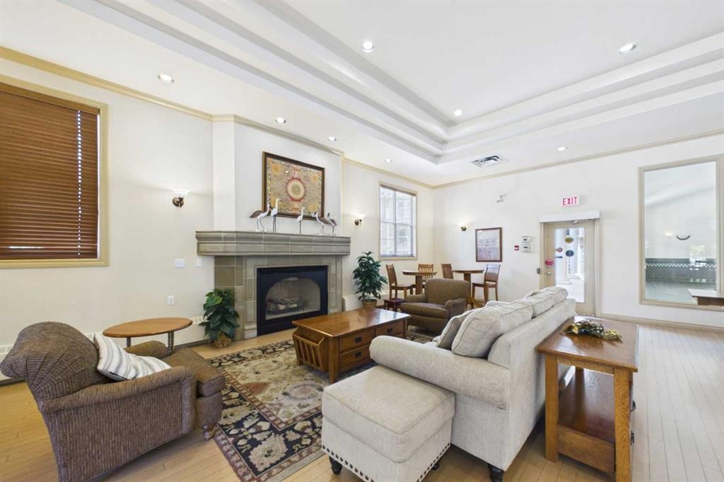 254-3000 Marda Link Sw, Calgary, AB - Indoor Photo Showing Living Room With Fireplace
