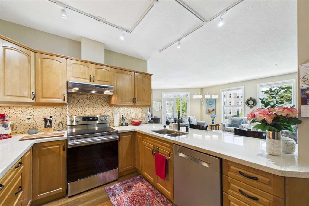 254-3000 Marda Link Sw, Calgary, AB - Indoor Photo Showing Kitchen With Double Sink