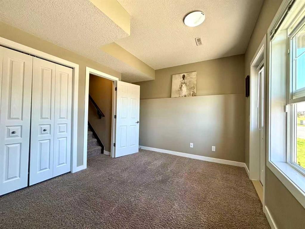 147 Panatella Hill, Calgary, AB - Indoor Photo Showing Other Room