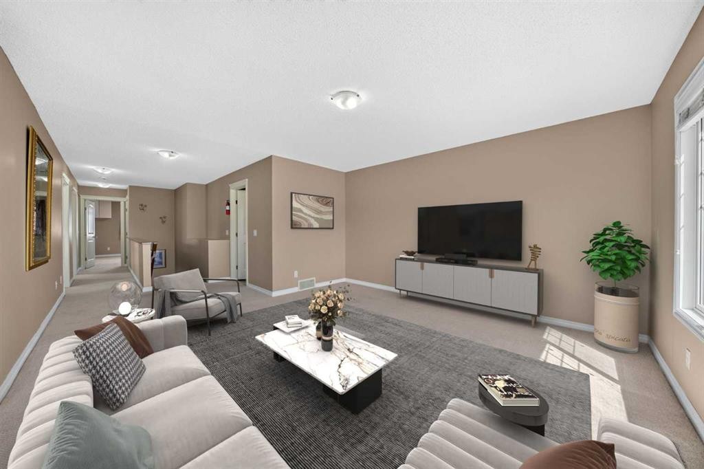202 Silverado Range Place Sw, Calgary, AB - Indoor Photo Showing Living Room