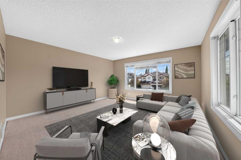 202 Silverado Range Place Sw, Calgary, AB - Indoor Photo Showing Living Room