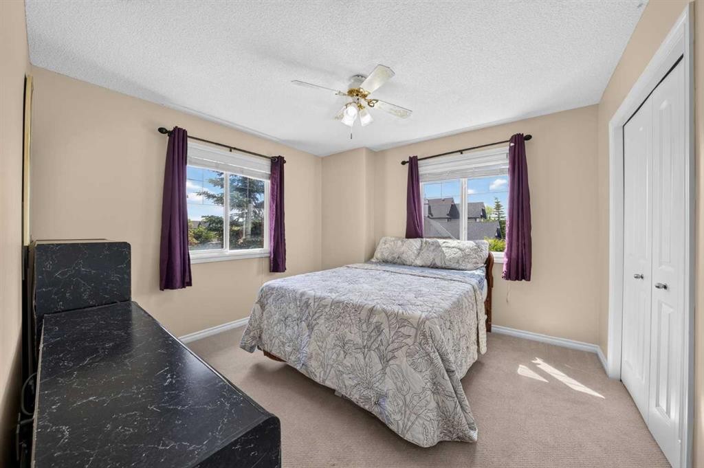 202 Silverado Range Place Sw, Calgary, AB - Indoor Photo Showing Bedroom