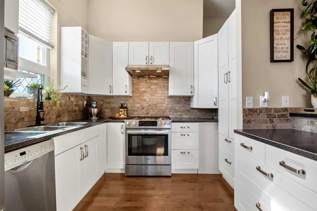 336 Butte Place, Stavely, AB - Indoor Photo Showing Kitchen With Double Sink With Upgraded Kitchen