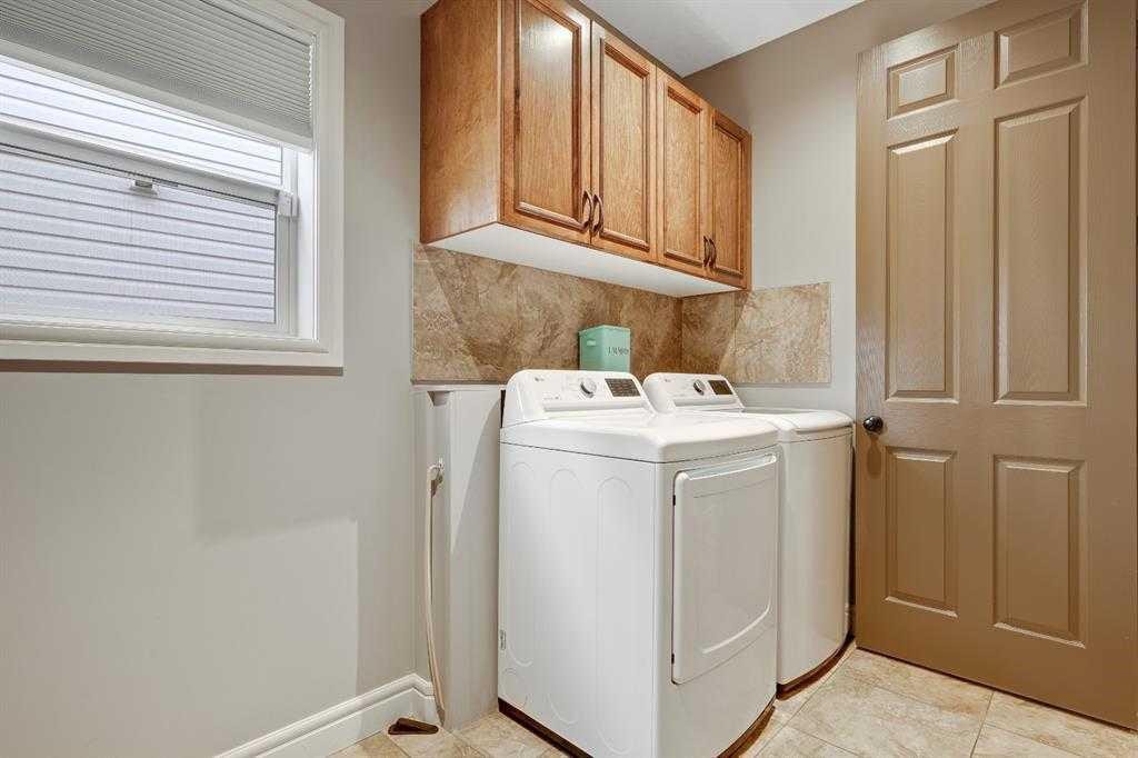 62 Copperleaf Terrace Se, Calgary, AB - Indoor Photo Showing Laundry Room