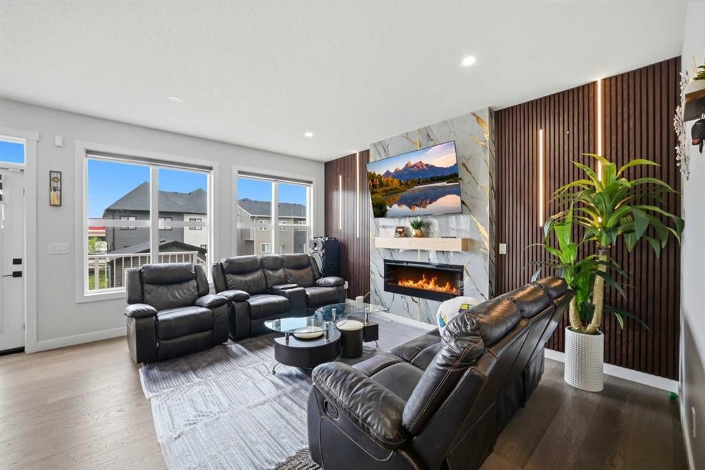 241 Homestead Crescent Ne, Calgary, AB - Indoor Photo Showing Living Room With Fireplace