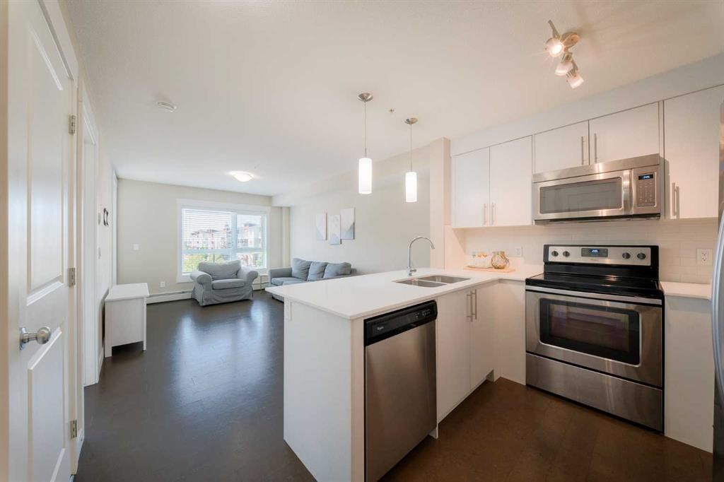 6305-302 Skyview Ranch Drive Ne, Calgary, AB - Indoor Photo Showing Kitchen With Stainless Steel Kitchen With Double Sink