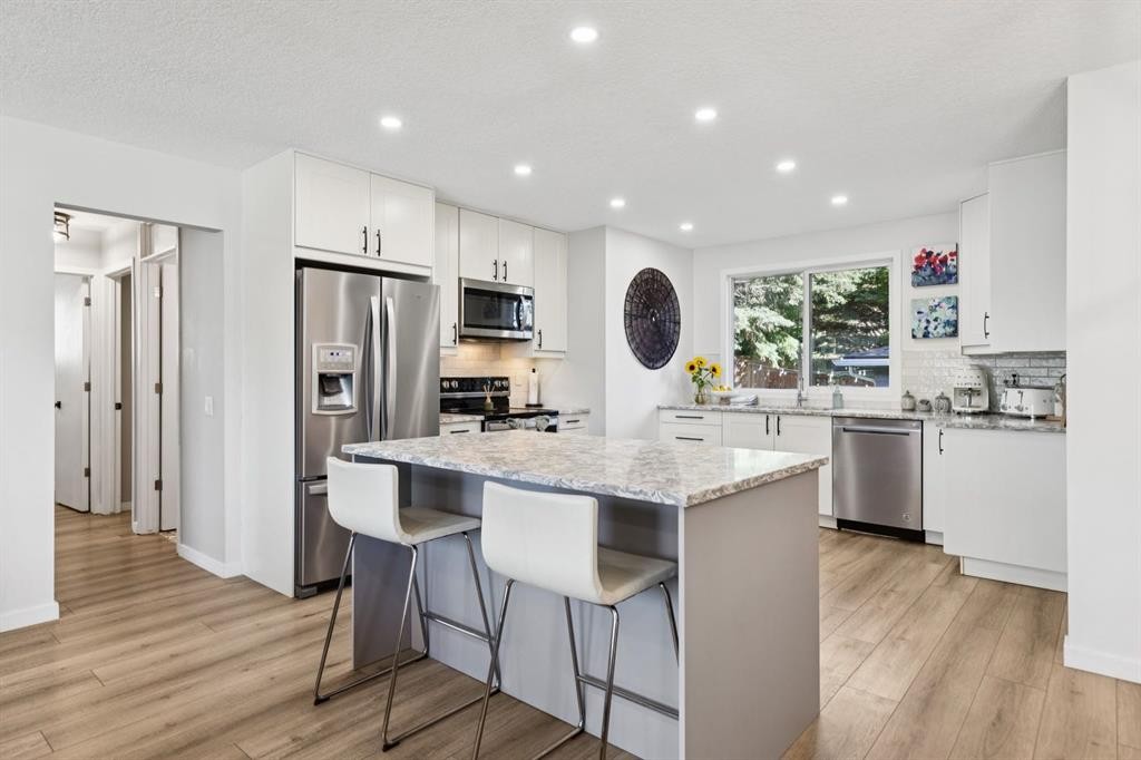 716 Cantree Road Sw, Calgary, AB - Indoor Photo Showing Kitchen With Stainless Steel Kitchen With Upgraded Kitchen