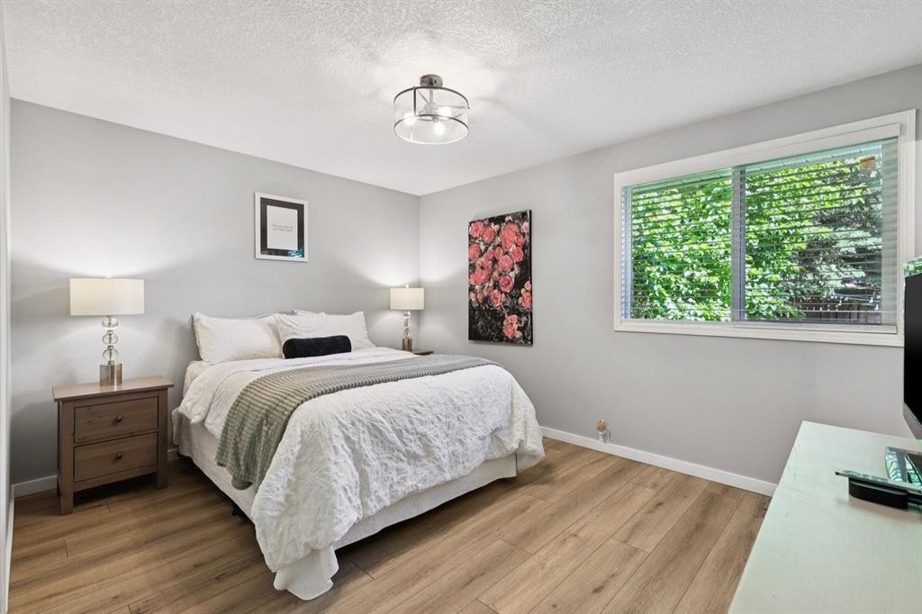 716 Cantree Road Sw, Calgary, AB - Indoor Photo Showing Bedroom