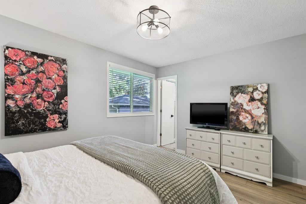 716 Cantree Road Sw, Calgary, AB - Indoor Photo Showing Bedroom