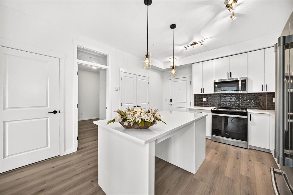 8317-151 Legacy Main Street Se, Calgary, AB - Indoor Photo Showing Kitchen With Stainless Steel Kitchen With Upgraded Kitchen