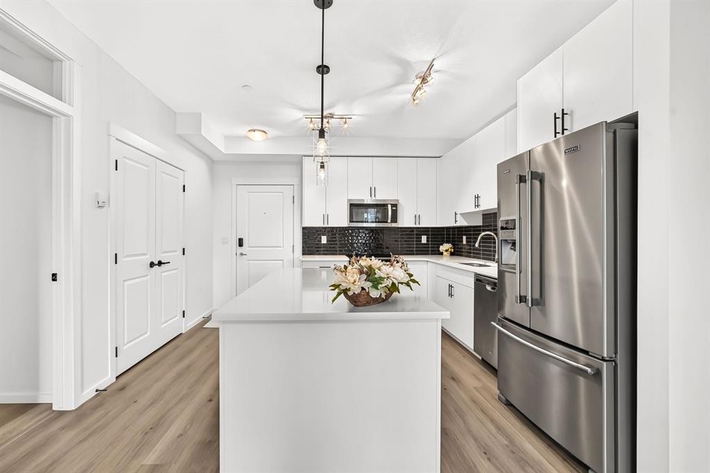 8317-151 Legacy Main Street Se, Calgary, AB - Indoor Photo Showing Kitchen With Stainless Steel Kitchen With Upgraded Kitchen