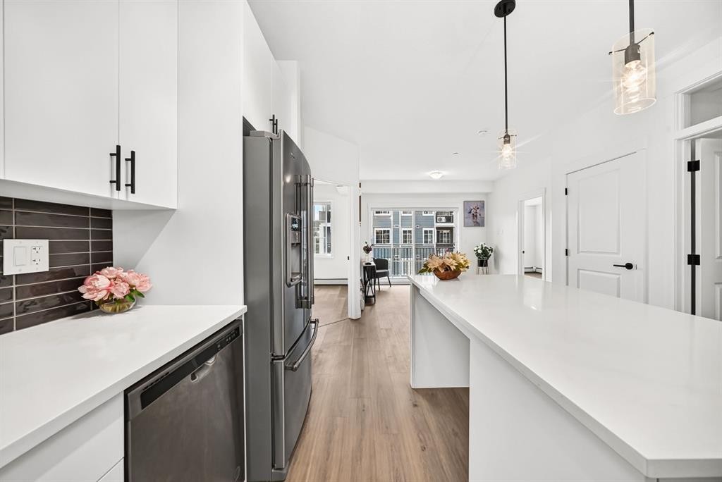 8317-151 Legacy Main Street Se, Calgary, AB - Indoor Photo Showing Kitchen With Upgraded Kitchen