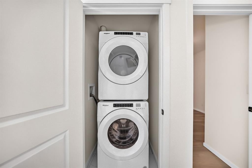 8317-151 Legacy Main Street Se, Calgary, AB - Indoor Photo Showing Laundry Room