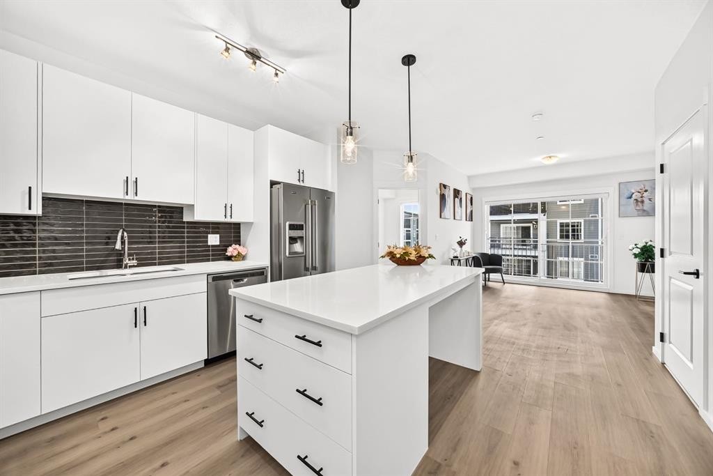 8317-151 Legacy Main Street Se, Calgary, AB - Indoor Photo Showing Kitchen With Upgraded Kitchen