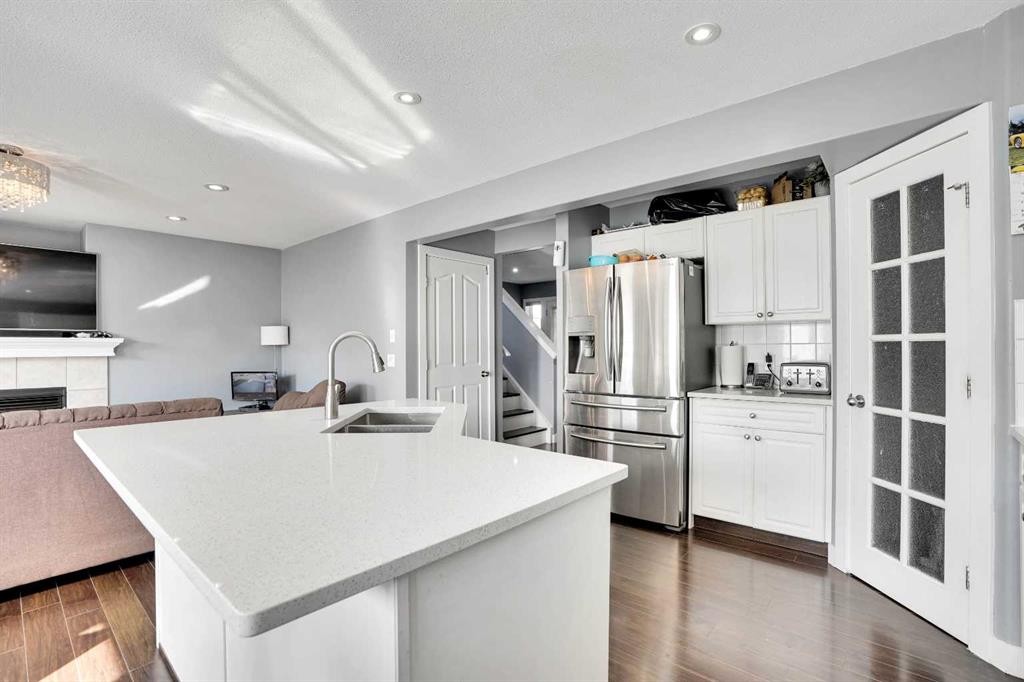 151 Saddlehorn Close Ne, Calgary, AB - Indoor Photo Showing Kitchen With Double Sink