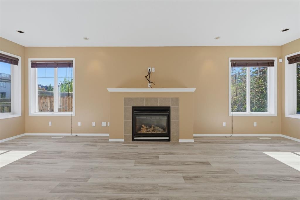 4 Everglen Grove Sw, Calgary, AB - Indoor Photo Showing Other Room With Fireplace