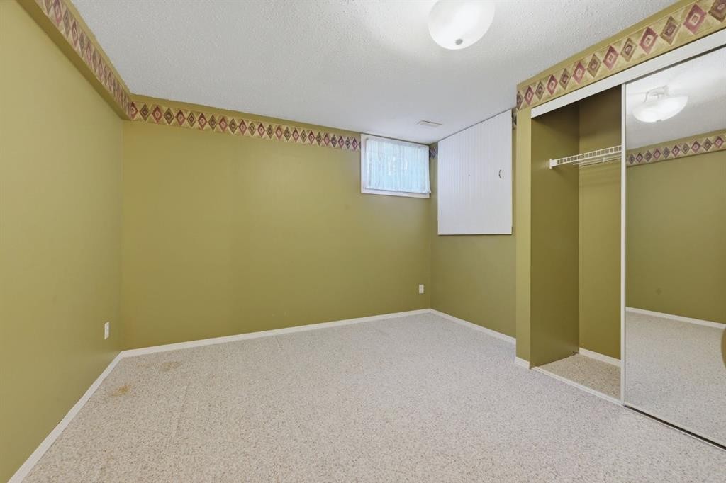 112 Dovista Court Se, Calgary, AB - Indoor Photo Showing Other Room