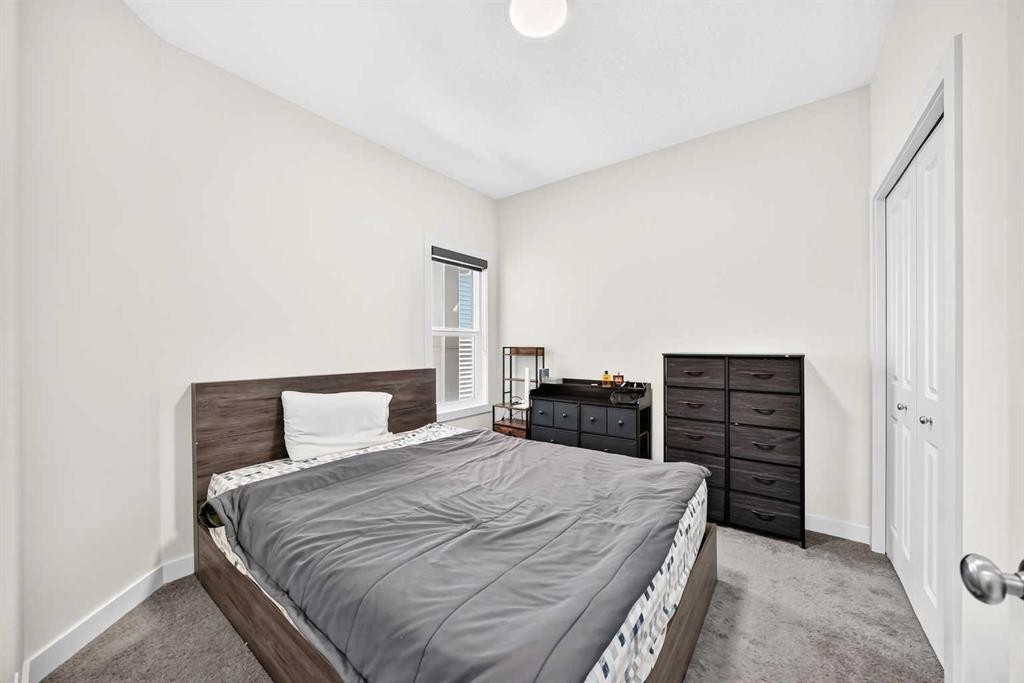 27 Belvedere Point Se, Calgary, AB - Indoor Photo Showing Bedroom