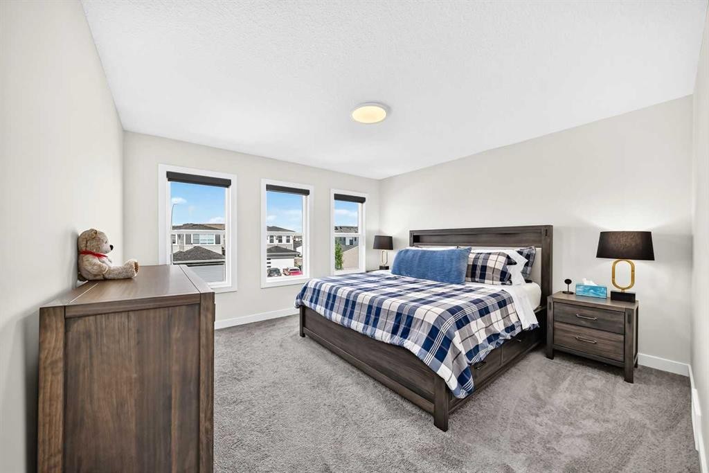 27 Belvedere Point Se, Calgary, AB - Indoor Photo Showing Bedroom