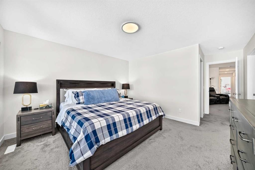 27 Belvedere Point Se, Calgary, AB - Indoor Photo Showing Bedroom