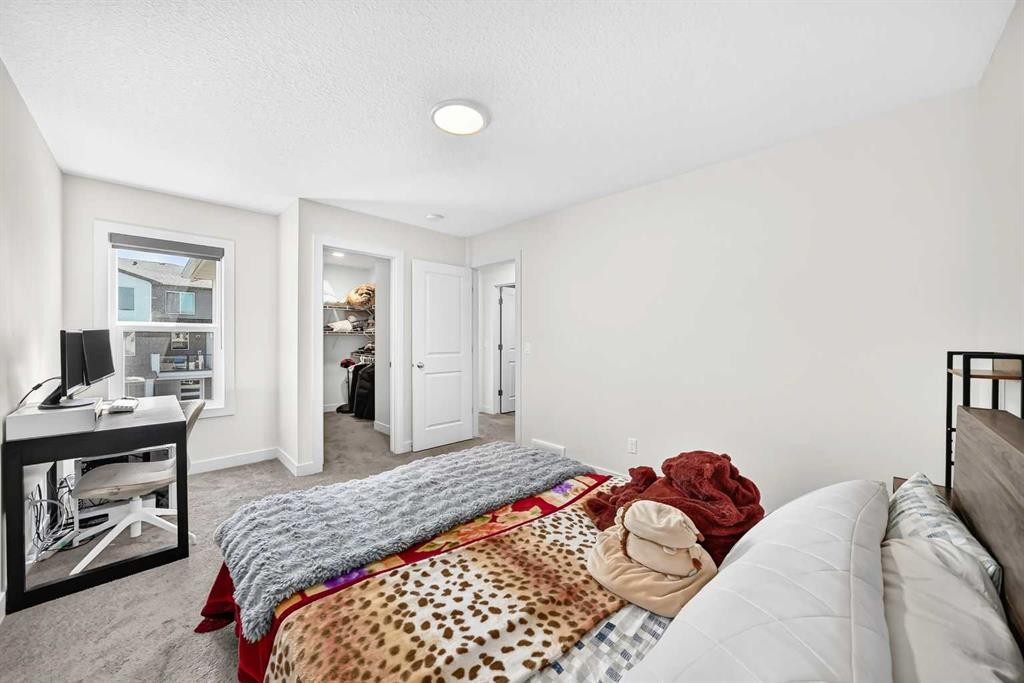 27 Belvedere Point Se, Calgary, AB - Indoor Photo Showing Bedroom