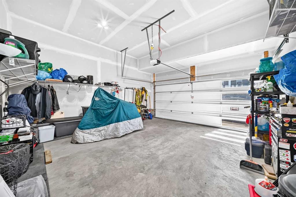 27 Belvedere Point Se, Calgary, AB - Indoor Photo Showing Garage