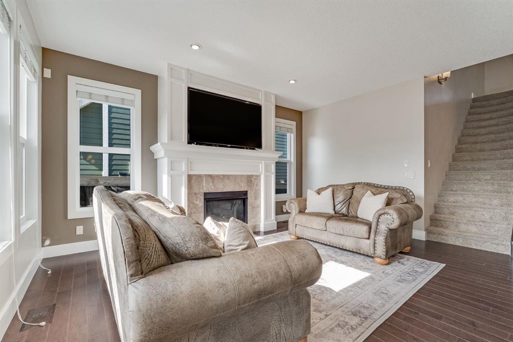 198 Mahogany Passage Se, Calgary, AB - Indoor Photo Showing Living Room With Fireplace