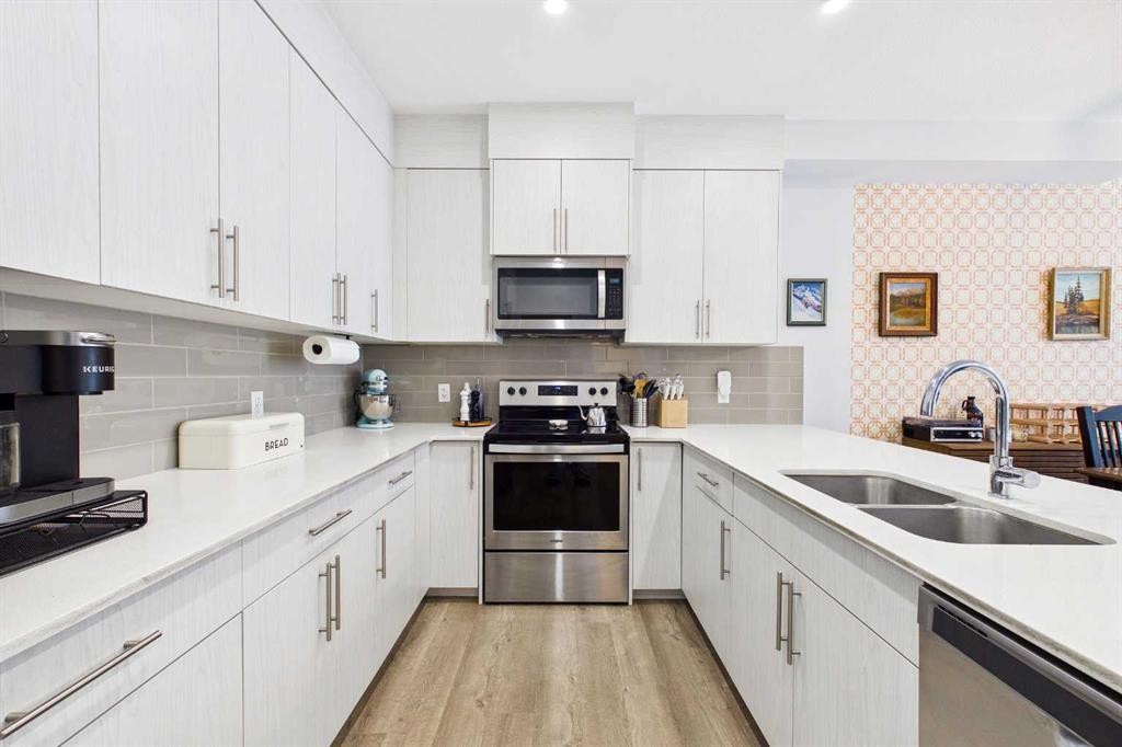 906 Sage Meadows Gardens Nw, Calgary, AB - Indoor Photo Showing Kitchen With Stainless Steel Kitchen With Double Sink With Upgraded Kitchen
