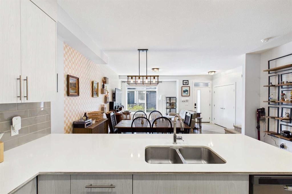 906 Sage Meadows Gardens Nw, Calgary, AB - Indoor Photo Showing Kitchen With Double Sink