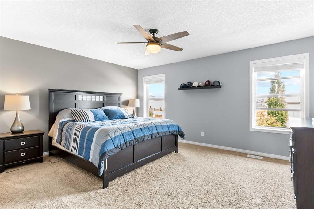 106 Morningside Circle Sw, Airdrie, AB - Indoor Photo Showing Bedroom