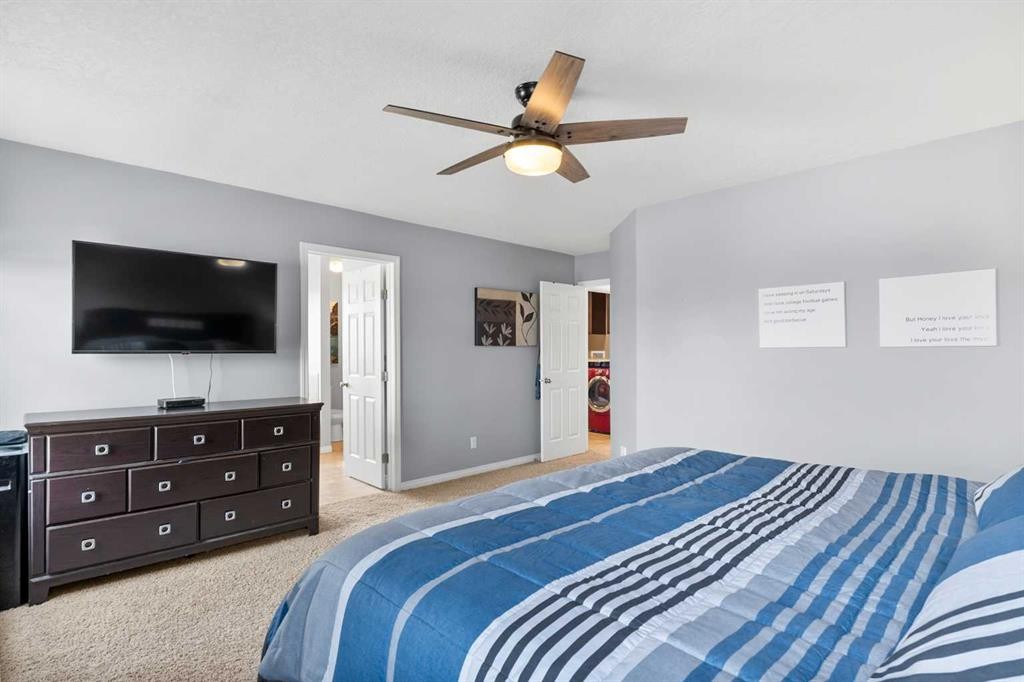 106 Morningside Circle Sw, Airdrie, AB - Indoor Photo Showing Bedroom