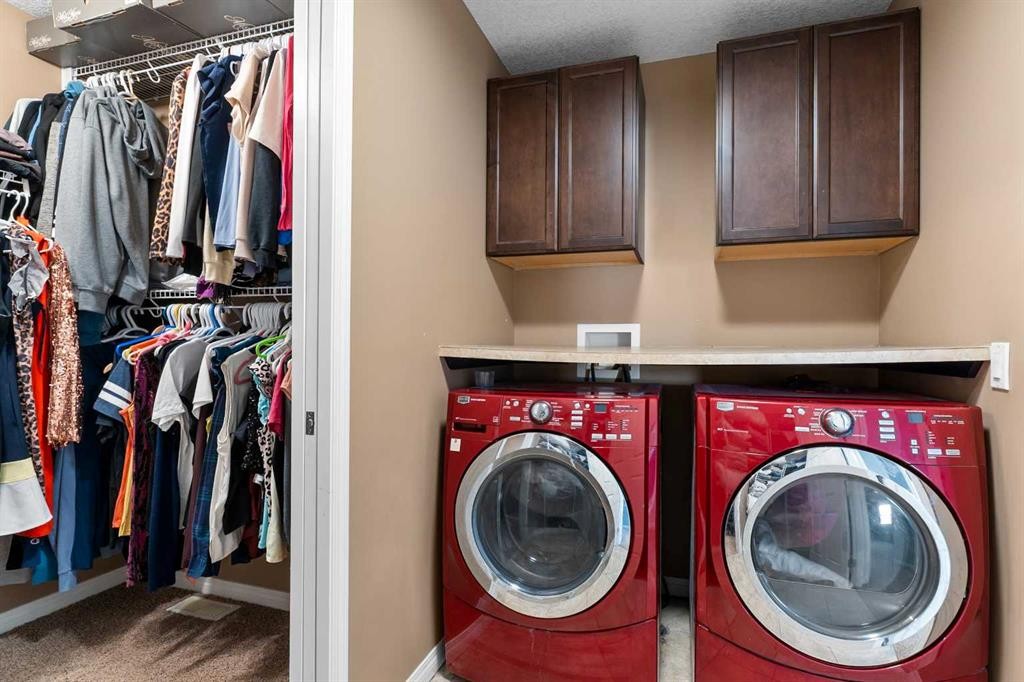 106 Morningside Circle Sw, Airdrie, AB - Indoor Photo Showing Laundry Room