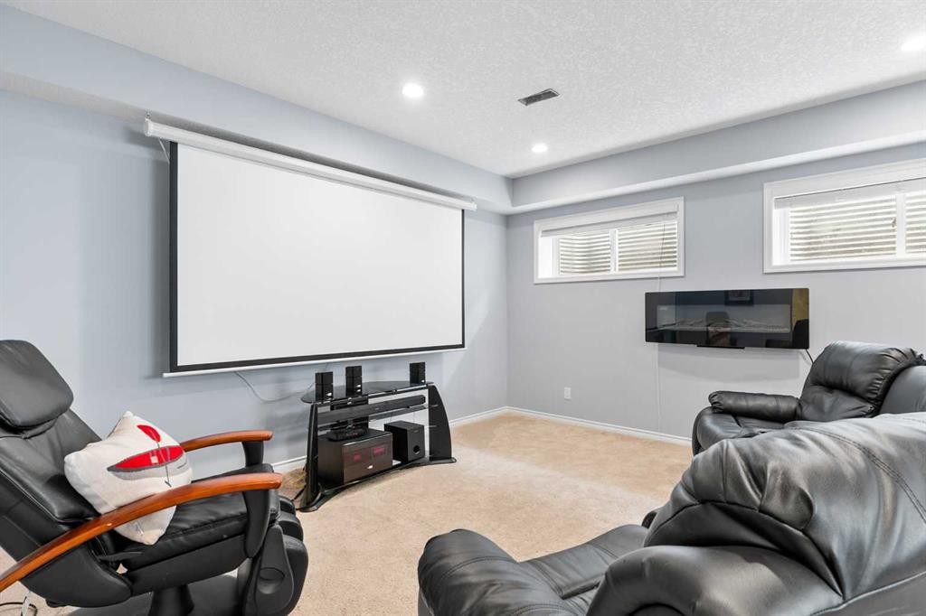 106 Morningside Circle Sw, Airdrie, AB - Indoor With Fireplace
