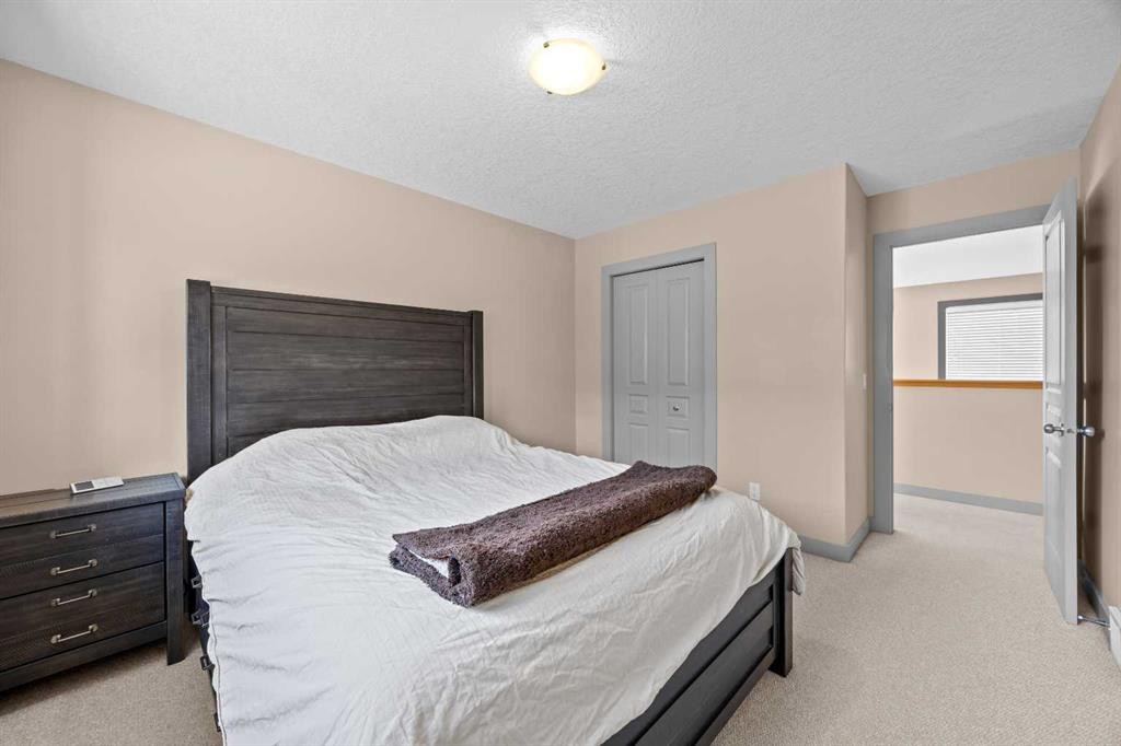 139 Tuscany Ridge Close Nw, Calgary, AB - Indoor Photo Showing Bedroom